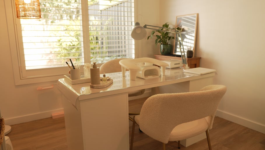 Calming interior of Bebella beauty venue in Avoca Beach, New South Wales, AU, showcasing a well-lit workspace.