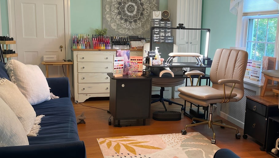 Inviting nail area at BEC Nail Studio LLC in Seaford, Delaware, US with modern seating and nail polish display.
