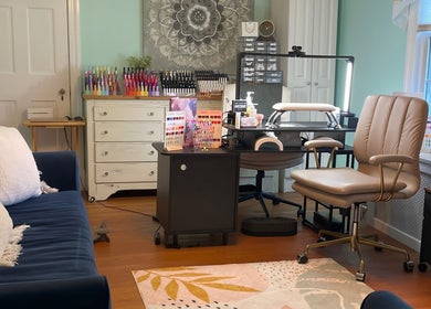 Inviting nail area at BEC Nail Studio LLC in Seaford, Delaware, US with modern seating and nail polish display.