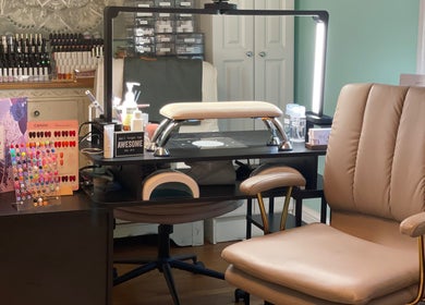 Elegant nail station at BEC Nail Studio LLC, Seaford, Delaware, US, showcasing a variety of nail colors.