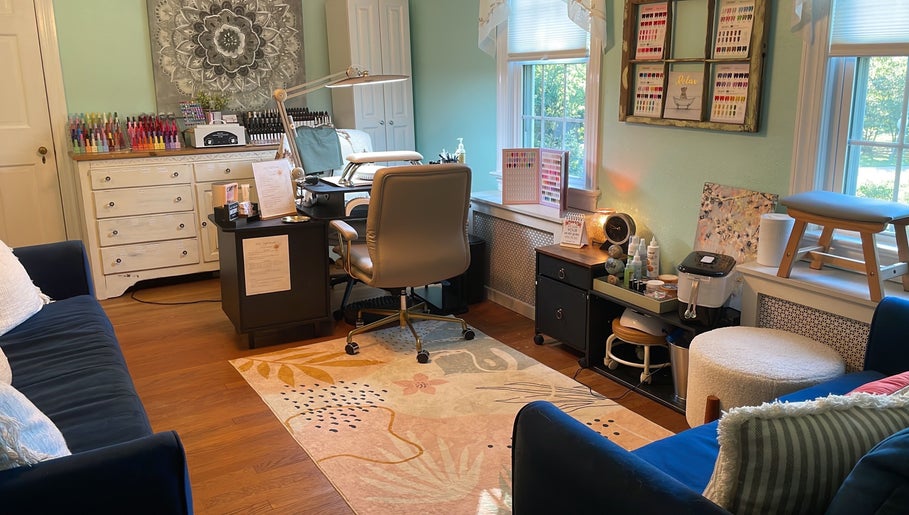 Interior of BEC Nail Studio LLC in Seaford, Delaware, US showcasing a stylish nail station with vibrant decor.