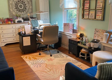Interior of BEC Nail Studio LLC in Seaford, Delaware, US showcasing a stylish nail station with vibrant decor.