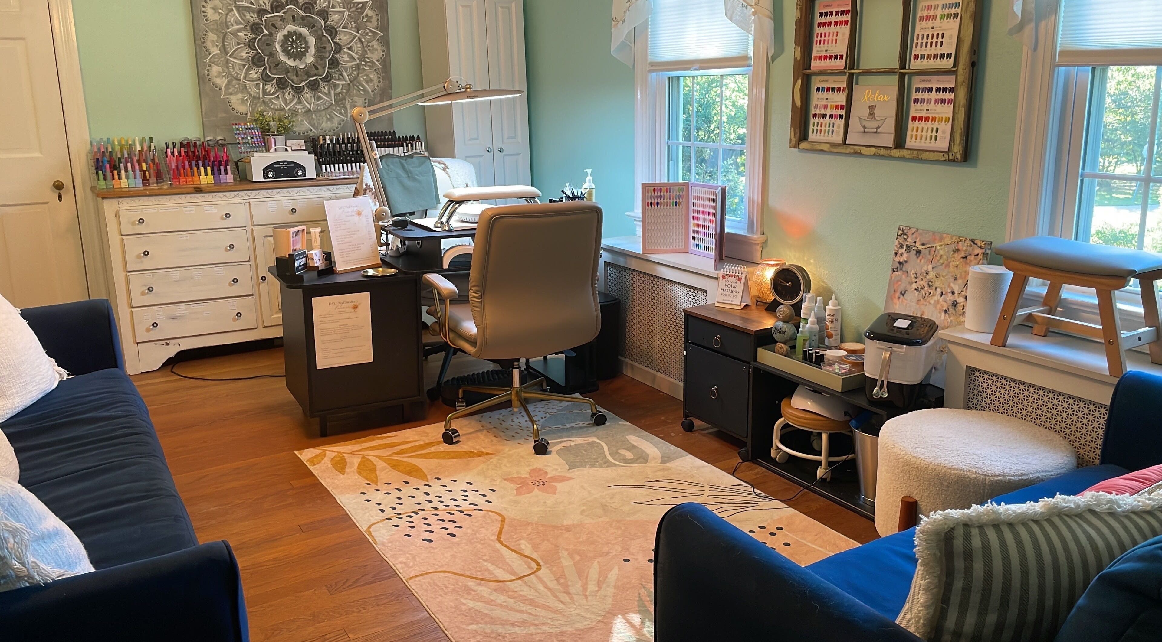 Interior of BEC Nail Studio LLC in Seaford, Delaware, US showcasing a stylish nail station with vibrant decor.