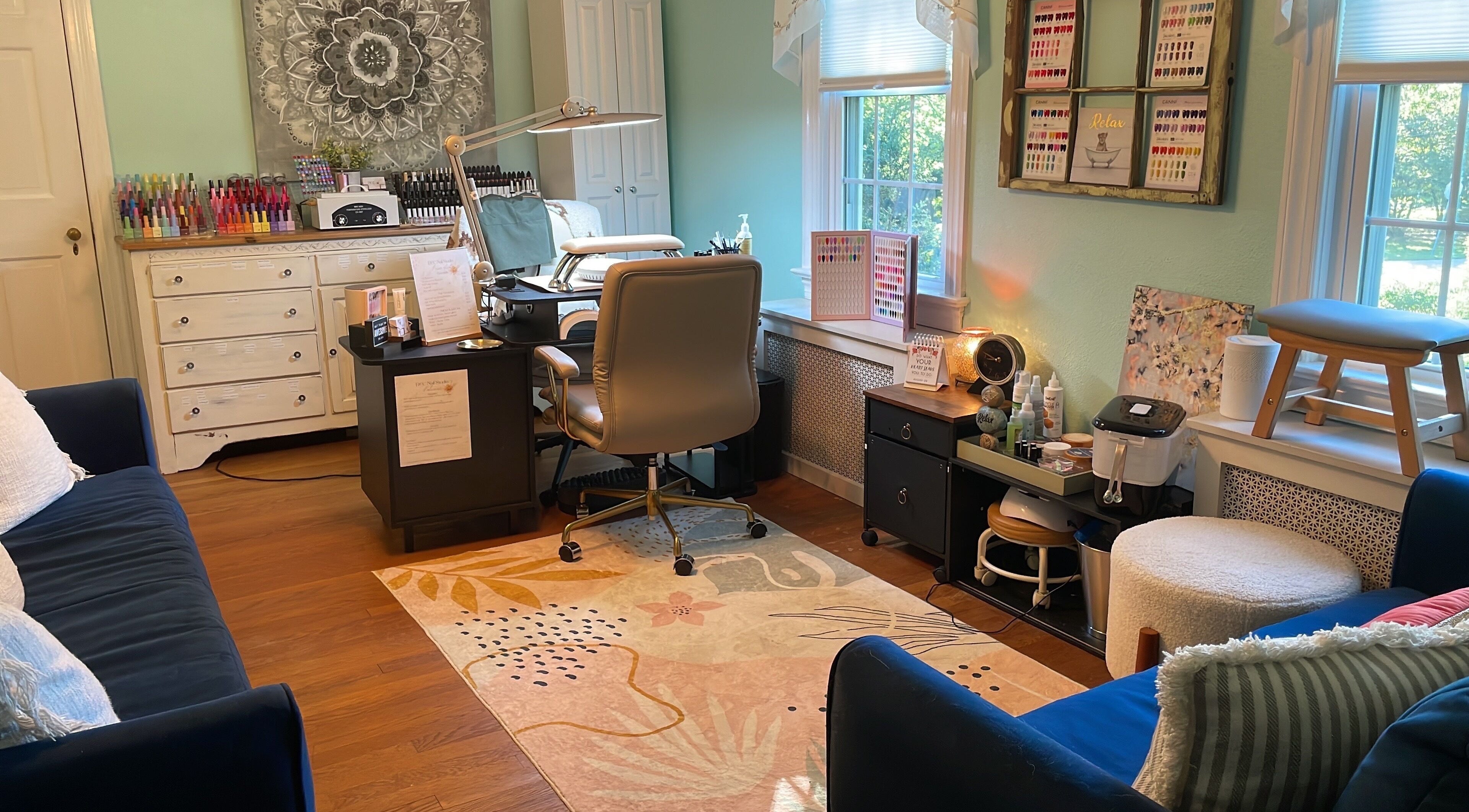 Interior of BEC Nail Studio LLC in Seaford, Delaware, US showcasing a stylish nail station with vibrant decor.