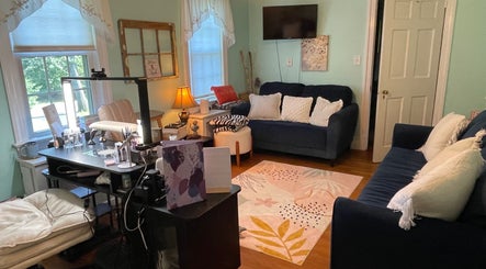 Inviting interior of BEC Nail Studio LLC in Seaford, Delaware, US with plush seating and nail station.