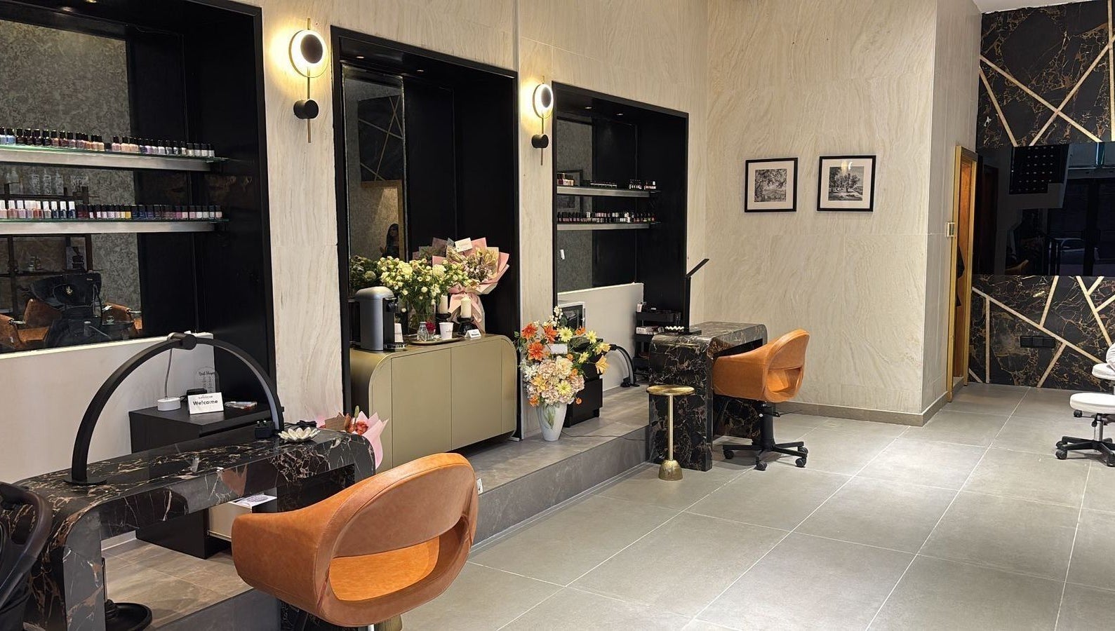 Chic interior of Rawan Star Salon in Jeddah, Makkah Province, SA showcasing elegant workstations and decor.