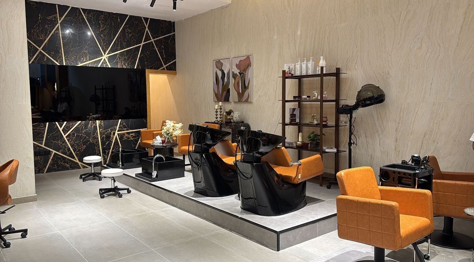 Modern interior of Rawan Star Salon, Jeddah, Makkah Province, SA with stylish seating and decor.