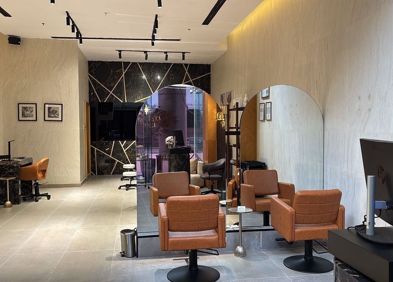 Elegant salon chairs and mirrors at Rawan Star Salon, Jeddah, Makkah Province, SA. Sophisticated décor and ambiance.