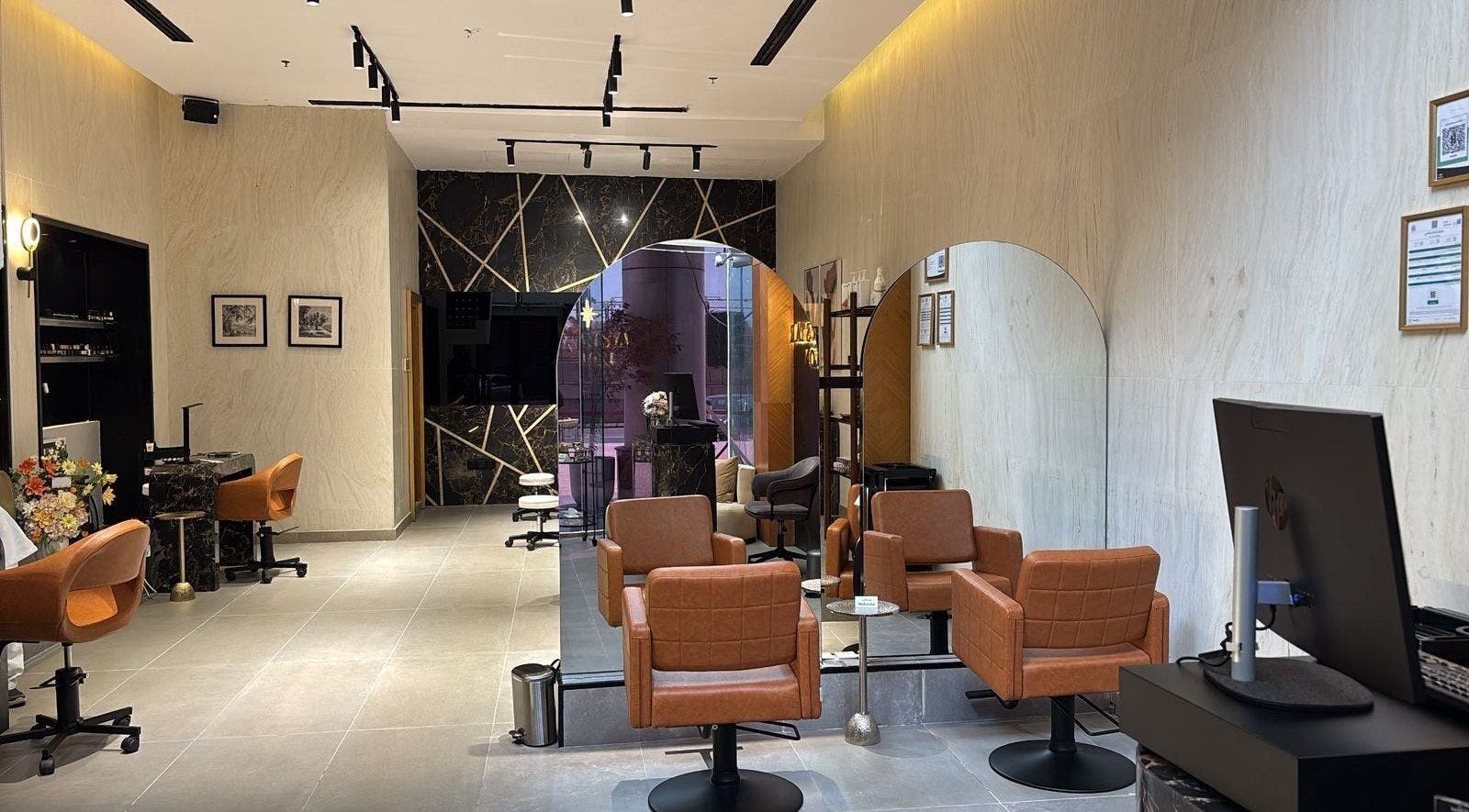 Elegant salon chairs and mirrors at Rawan Star Salon, Jeddah, Makkah Province, SA. Sophisticated décor and ambiance.