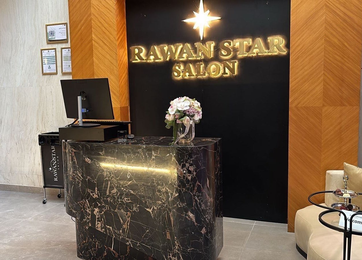 Reception desk at Rawan Star Salon in Jeddah, Makkah Province, SA with a chic marble finish.