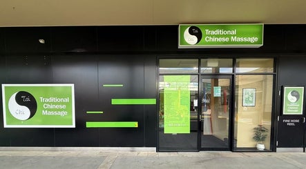 Entrance of Tai-Chi Chinese Traditional Massage Kingston in Hobart, Tasmania, AU with signage and glass door.