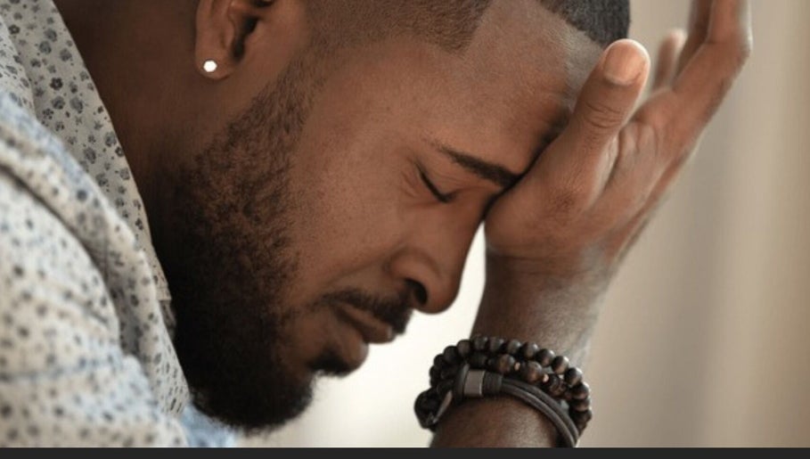 Man reflecting at Men Empowerment Network Support, Bridgetown, Saint Michael, BB.