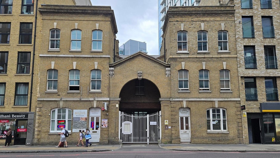 Historic building facade in London, England near Alto Hair Studio, showcasing classic architecture.