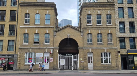 Historic building facade in London, England near Alto Hair Studio, showcasing classic architecture.