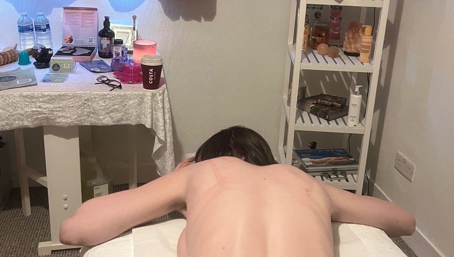 Peaceful setting at Glasgow harmony 'home based' massage in Glasgow, Scotland, GB with table and wellness items.