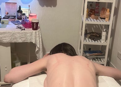 Peaceful setting at Glasgow harmony 'home based' massage in Glasgow, Scotland, GB with table and wellness items.