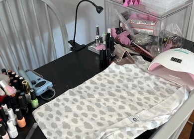 Sheeniquebnails nail station setup in St. Catharines, Ontario featuring tools and polishes.