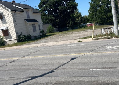 Street view near Sheeniquebnails, St. Catharines, Ontario, CA with a vintage building.