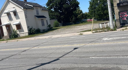 Street view near Sheeniquebnails, St. Catharines, Ontario, CA with a vintage building.