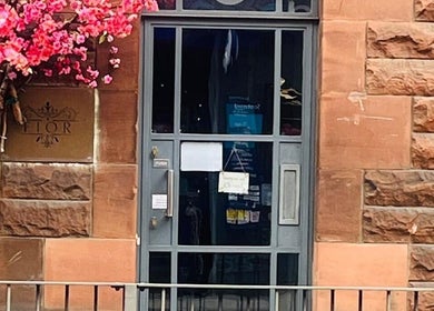 Charming entrance of Fairy Tale Therapies Ltd with blooming flowers, Edinburgh, Scotland, GB.