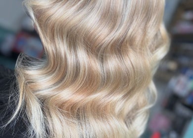 Blonde wavy hair styled at Couture Hair and Beauty in Wolverhampton, England, GB.
