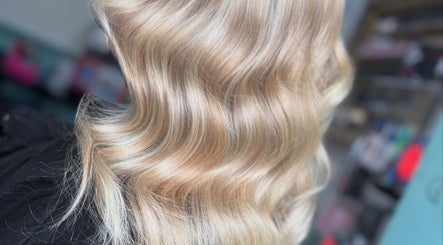 Blonde wavy hair styled at Couture Hair and Beauty in Wolverhampton, England, GB.