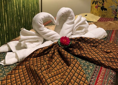 Elegant towel swans with floral decor at Eden Thai Massage & Spa - Kingsland, Auckland, Auckland, NZ.