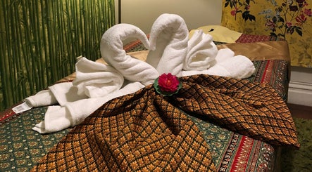 Elegant towel swans with floral decor at Eden Thai Massage & Spa - Kingsland, Auckland, Auckland, NZ.