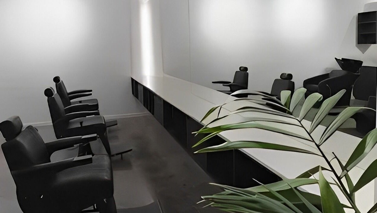 Modern barber chairs and sleek decor at Whistle & Flute Barber Studio, Auckland, Auckland, NZ.