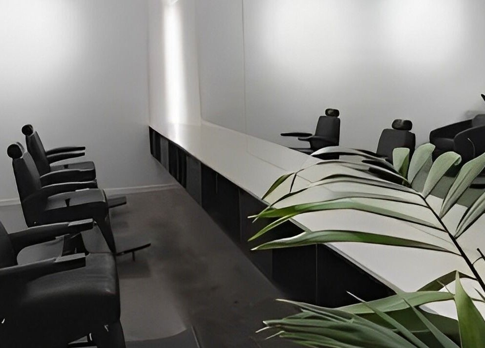 Modern barber chairs and sleek decor at Whistle & Flute Barber Studio, Auckland, Auckland, NZ.