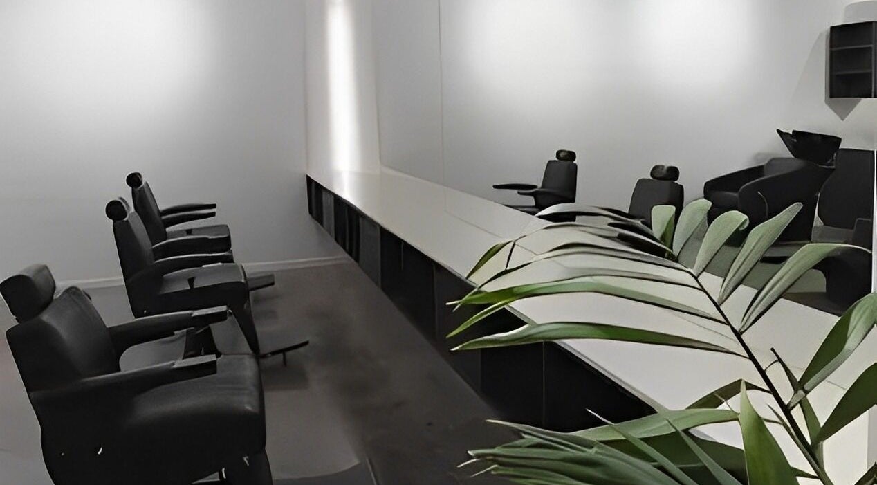 Modern barber chairs and sleek decor at Whistle & Flute Barber Studio, Auckland, Auckland, NZ.