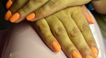 Fresh peach-colored manicure at Nails with Carly, Great Bookham, England, GB. Elegant nail design.