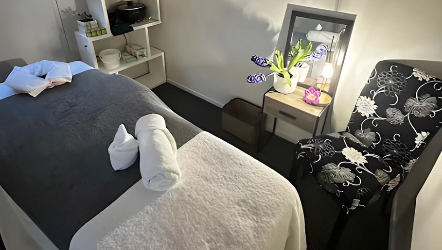 Relaxing massage room at Pam Thai Hand Massage, Taupō, Waikato Region, NZ with cozy bed and elegant decor.