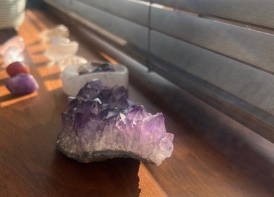 Crystals bathed in sunlight at Earth Glow Holistic Wellness in Preston, England, GB, enhancing tranquility.
