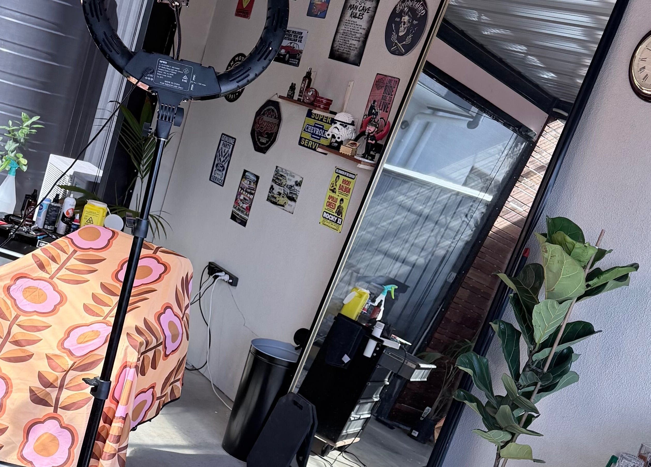 Bright salon corner at TheGarageChair, Port Adelaide, South Australia, AU with trendy decor and vibrant chair cover.