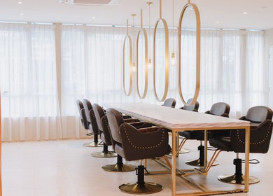Elegant salon chairs and mirrors at Aurora Muslimah Salon & Spa Bukit Rimau in Shah Alam, Selangor, MY.