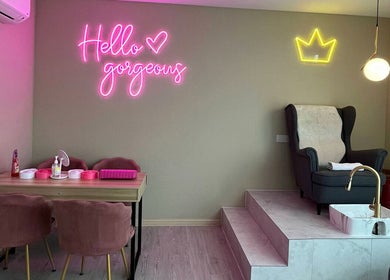Aurora Muslimah Salon & Spa Bukit Rimau, Shah Alam, Selangor, MY showcases a chic salon interior with pink neon lights.