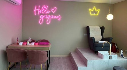 Aurora Muslimah Salon & Spa Bukit Rimau, Shah Alam, Selangor, MY showcases a chic salon interior with pink neon lights.