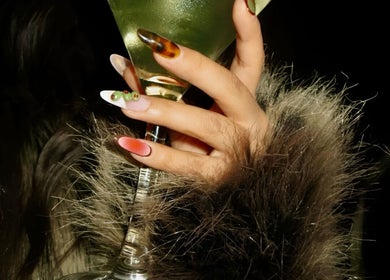 Stylish nail art from The Third Salon, Riyadh, Riyadh Province, SA, featuring vibrant colors and elegant design.