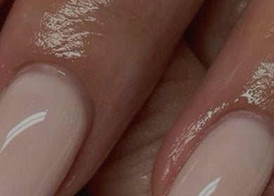 Elegant, glossy manicure at The Third Salon, Riyadh, Riyadh Province, SA, showcasing expert nail care.