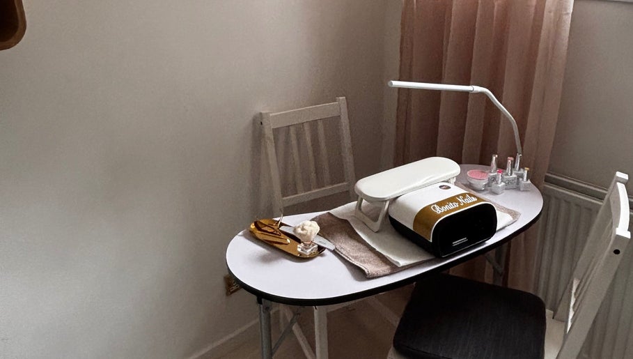 Nail station at Bonito Nails, North Berwick, Scotland, GB with manicure tools and lamp.