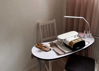 Nail station at Bonito Nails, North Berwick, Scotland, GB with manicure tools and lamp.