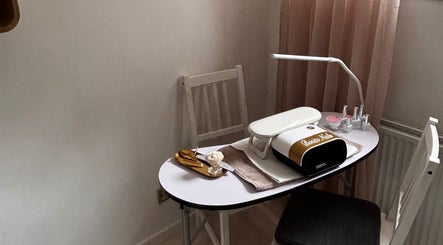 Nail station at Bonito Nails, North Berwick, Scotland, GB with manicure tools and lamp.