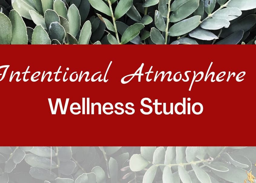 Intentional Atmosphere wellness Studio logo with green leaves background, Parys, Free State, ZA.