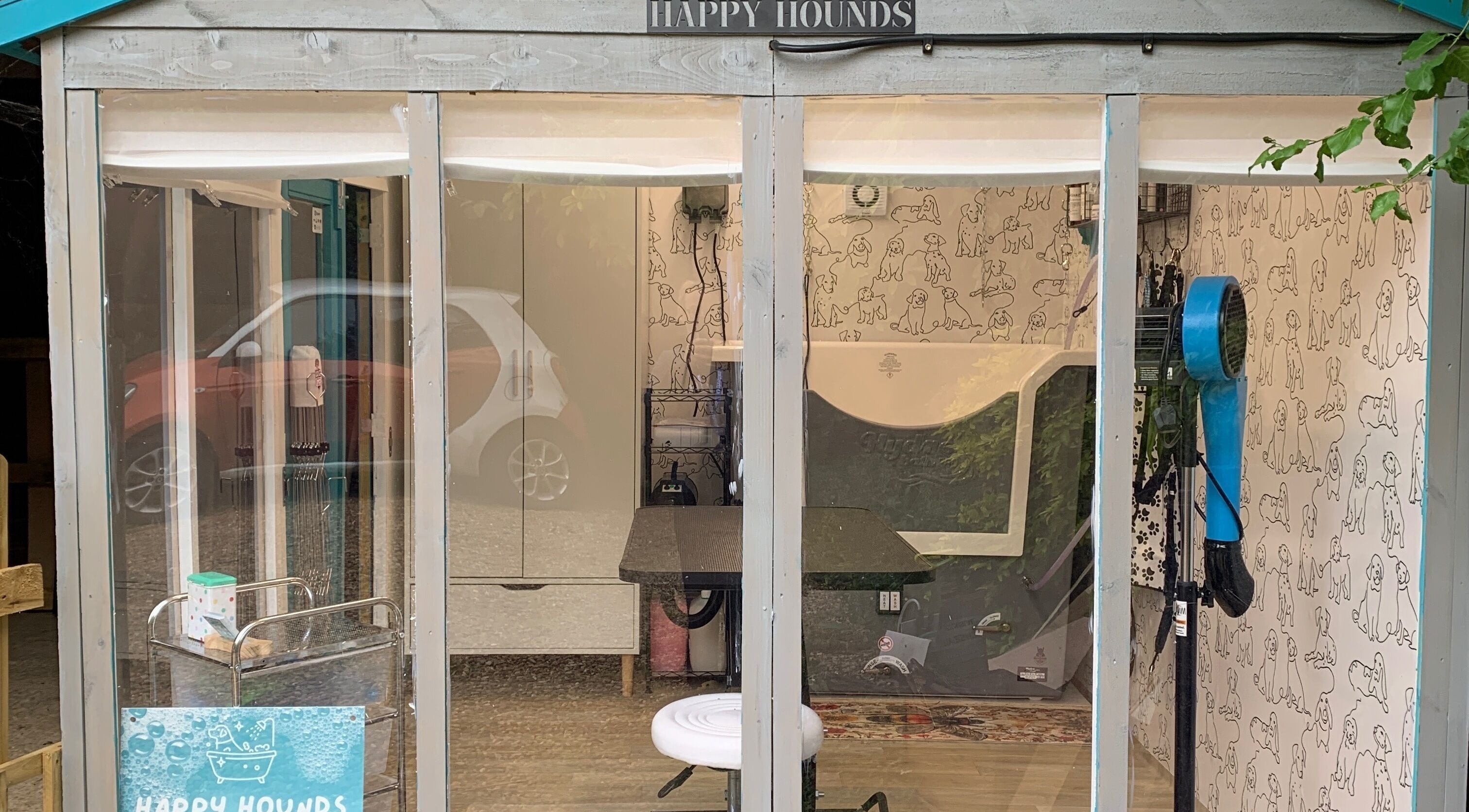 Interior view of Happy Hounds Dog Grooming in Wisbech Saint Mary, England, GB, showcasing grooming equipment.