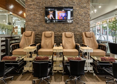 Relaxing pedicure chairs at La Lotus Nails Spa, Vancouver, British Columbia, CA offer comfort and elegance.