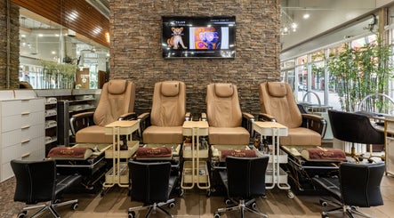 Relaxing pedicure chairs at La Lotus Nails Spa, Vancouver, British Columbia, CA offer comfort and elegance.