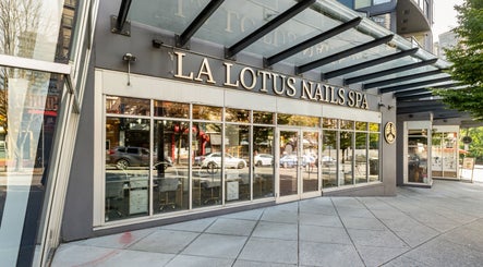 Exterior of La Lotus Nails Spa in Vancouver, British Columbia, CA with stylish glass windows.