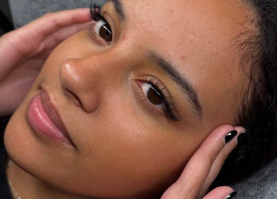 Close-up of a woman's face with elegant lashes at BLINX, Buckhurst Hill, England, GB.