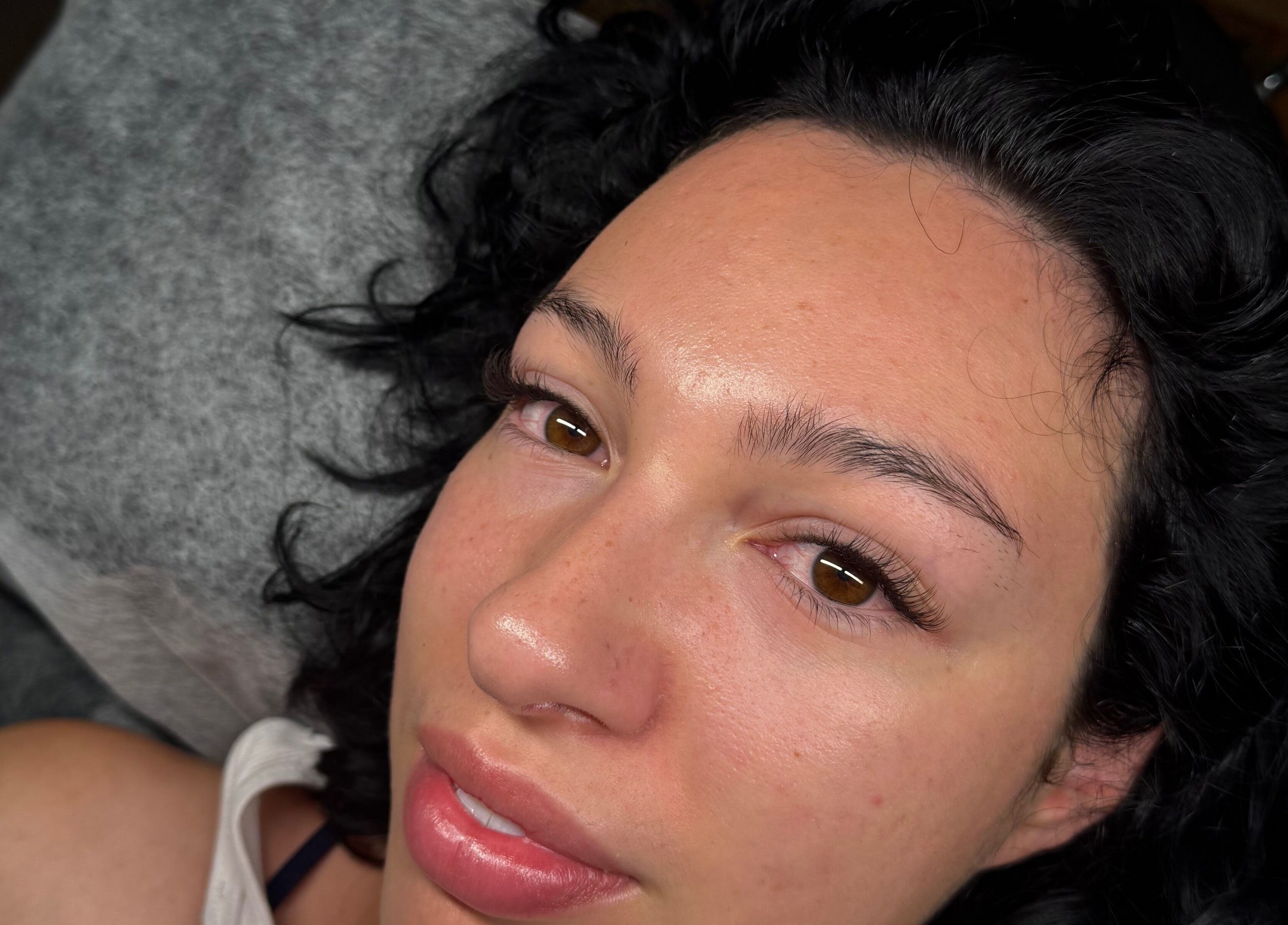 Close-up of a woman with lush eyelashes at Blinx, London, England, GB.